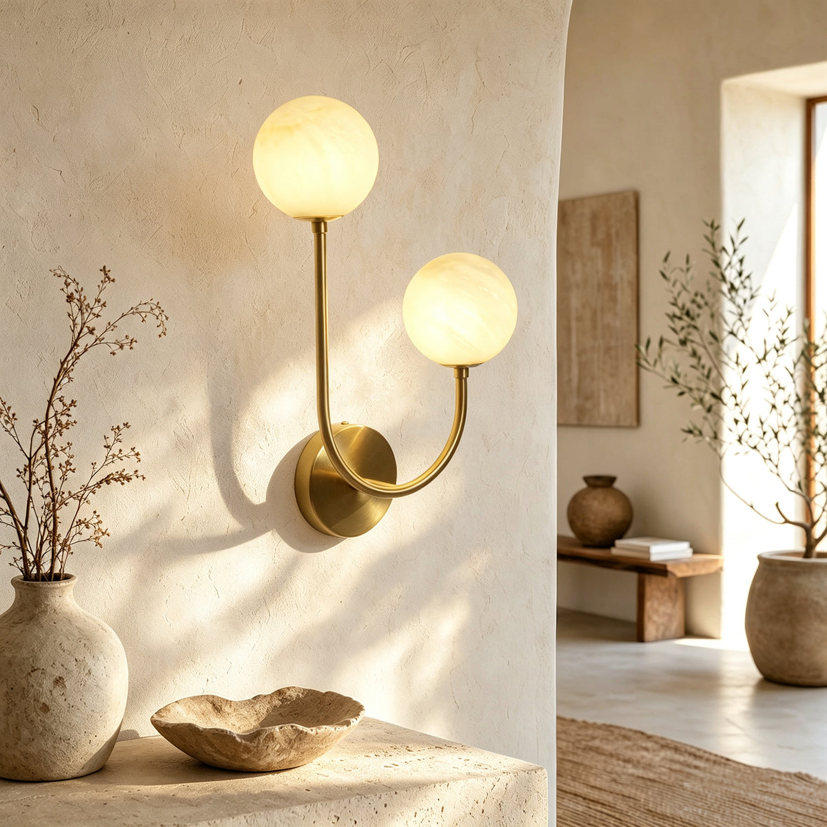 Modern 2-Light Globe Wall Sconce with Faux Alabaster Glass Shades and Brass Finish