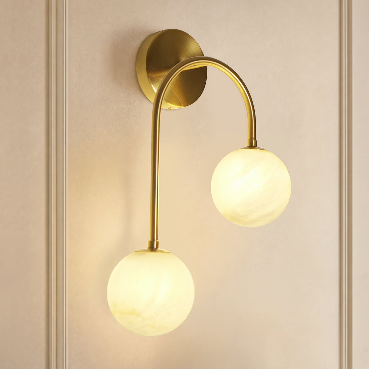 Modern 2-Light Globe Wall Sconce with Faux Alabaster Glass Shades and Brass Finish