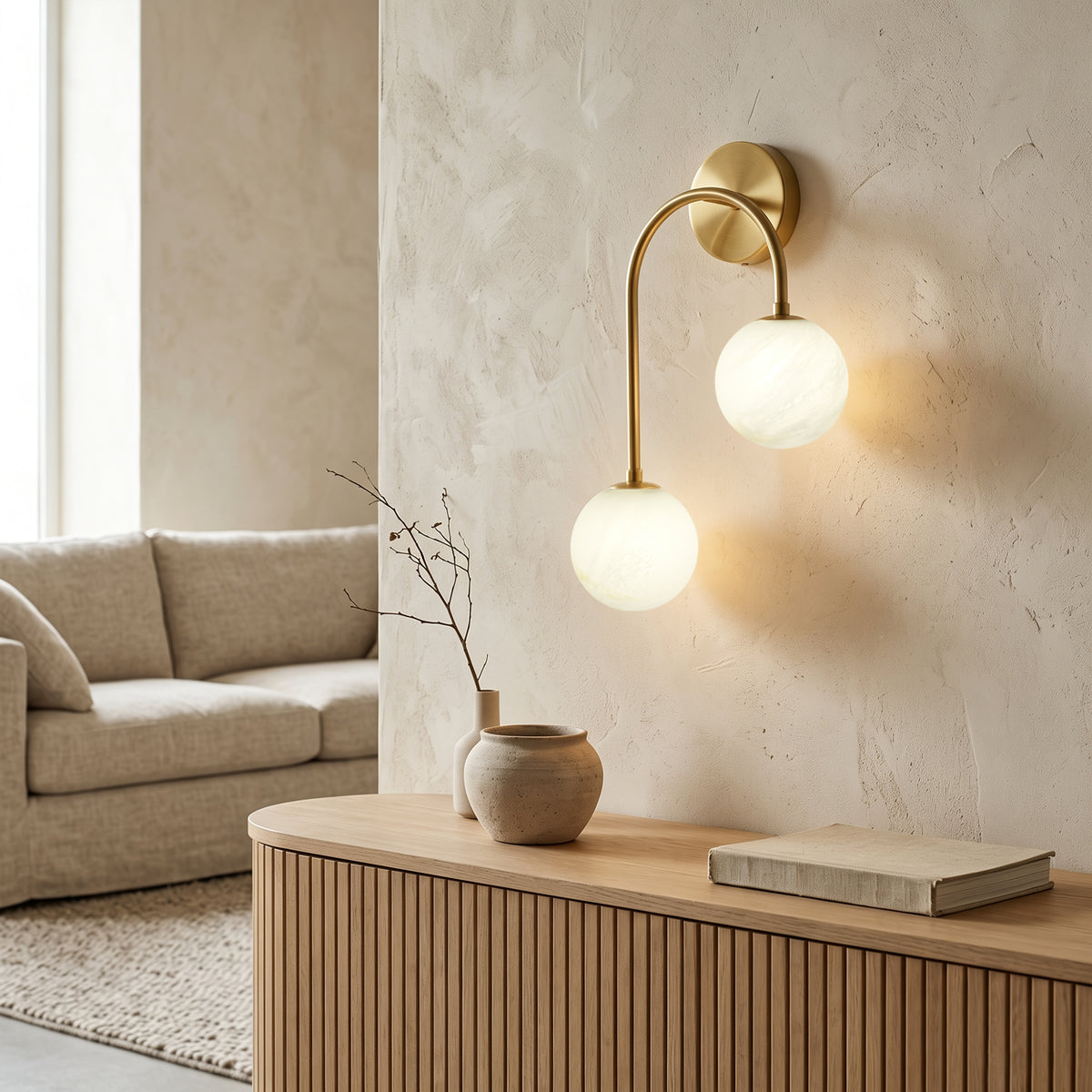 Modern 2-Light Globe Wall Sconce with Faux Alabaster Glass Shades and Brass Finish